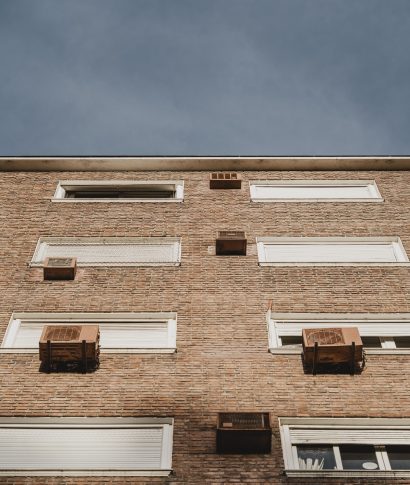 low-angle-residential-building-city-with-air-conditioning-units